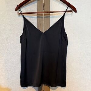 H&M black satin camisole top with spaghetti straps and a v-neckline.